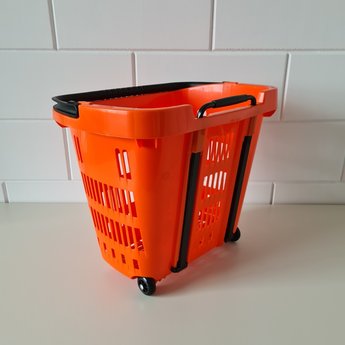 Winkelmand >Shop en Roll< op rubberen wielen oranje  Ral 2010 / pantone 158C, met uitschuifbaar handgreep van aluminium, hoogte 90cm.