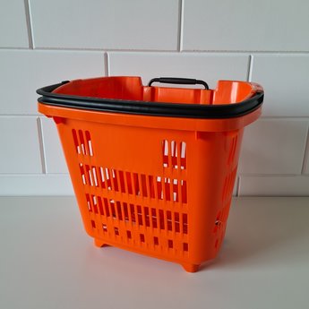 Winkelmand >Shop en Roll< op rubberen wielen oranje  Ral 2010 / pantone 158C, met uitschuifbaar handgreep van aluminium, hoogte 90cm.