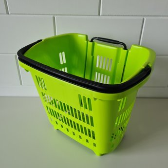 Winkelmand >Shop en Roll< op rubberen wielen lichtgroen Ral 6032 / pantone 361, met uitschuifbaar handgreep van aluminium, hoogte 90cm.