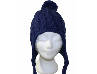 Gebreide pompon muts blauw