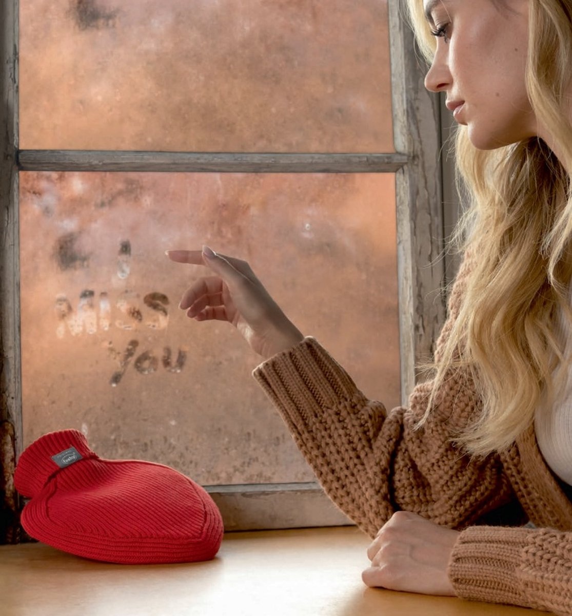 Warmwaterkruik Hartvorm 0.7 L. Gebreide hoes Rood