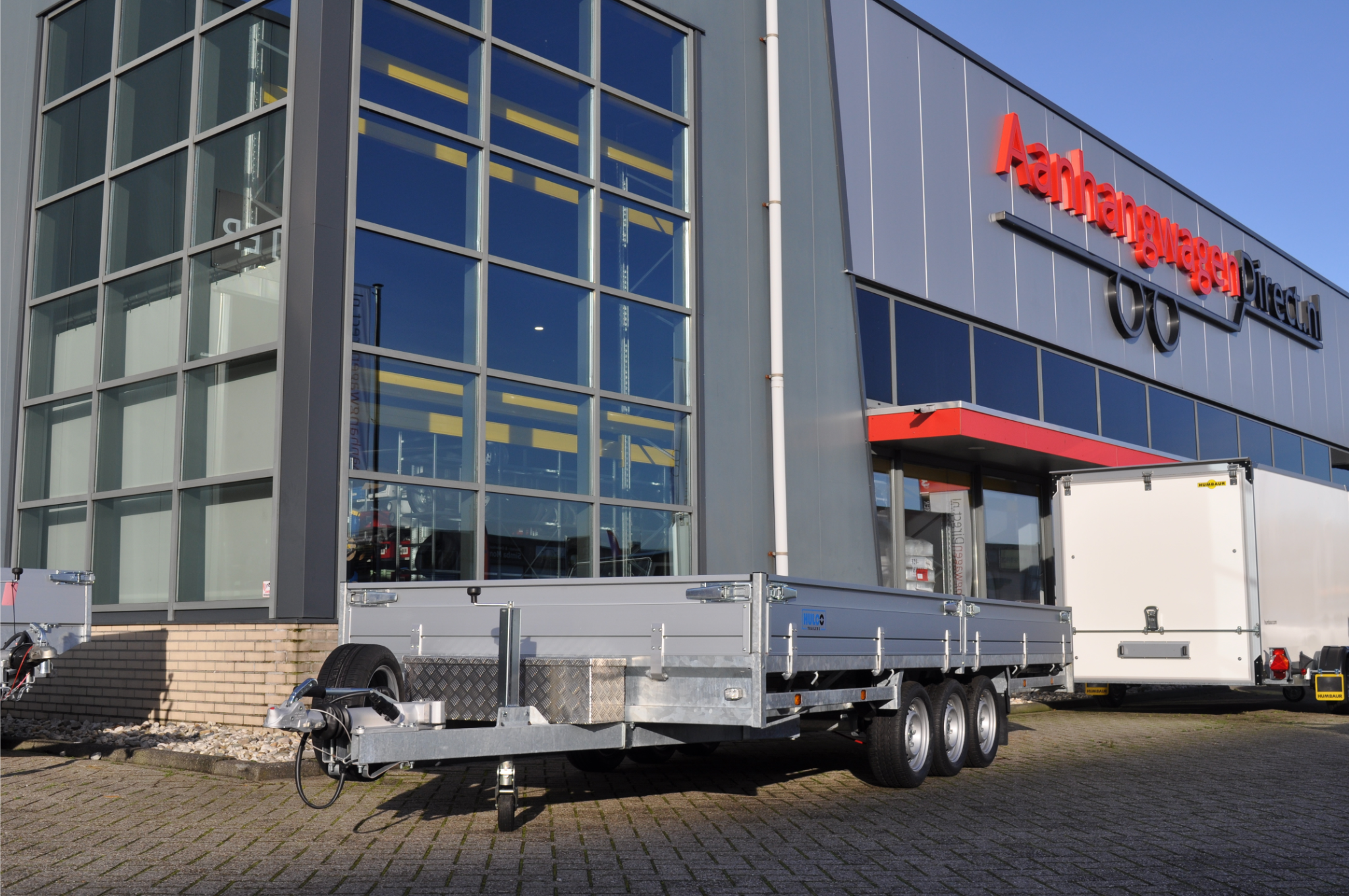 Magazijn uitverkoop - geremde Hulco Medax plateauwagen - 502x203 cm - 3500 kg bruto laadvermogen - 30 cm borden - tridemasser - met gratis disselkist en reservewiel + houder