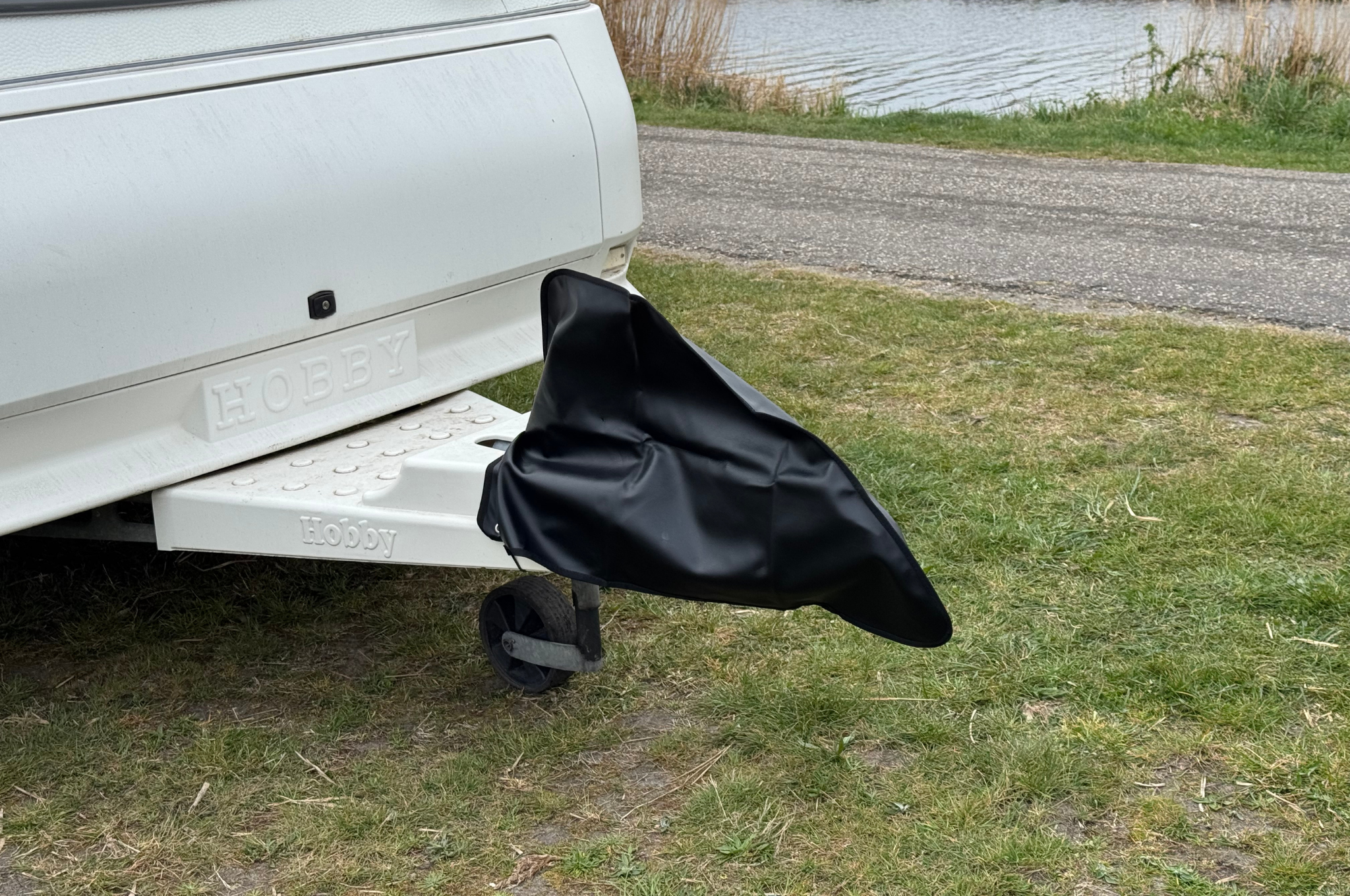 Zwarte disselhoes 87x55 cm - PU materiaal - inclusief elastiek