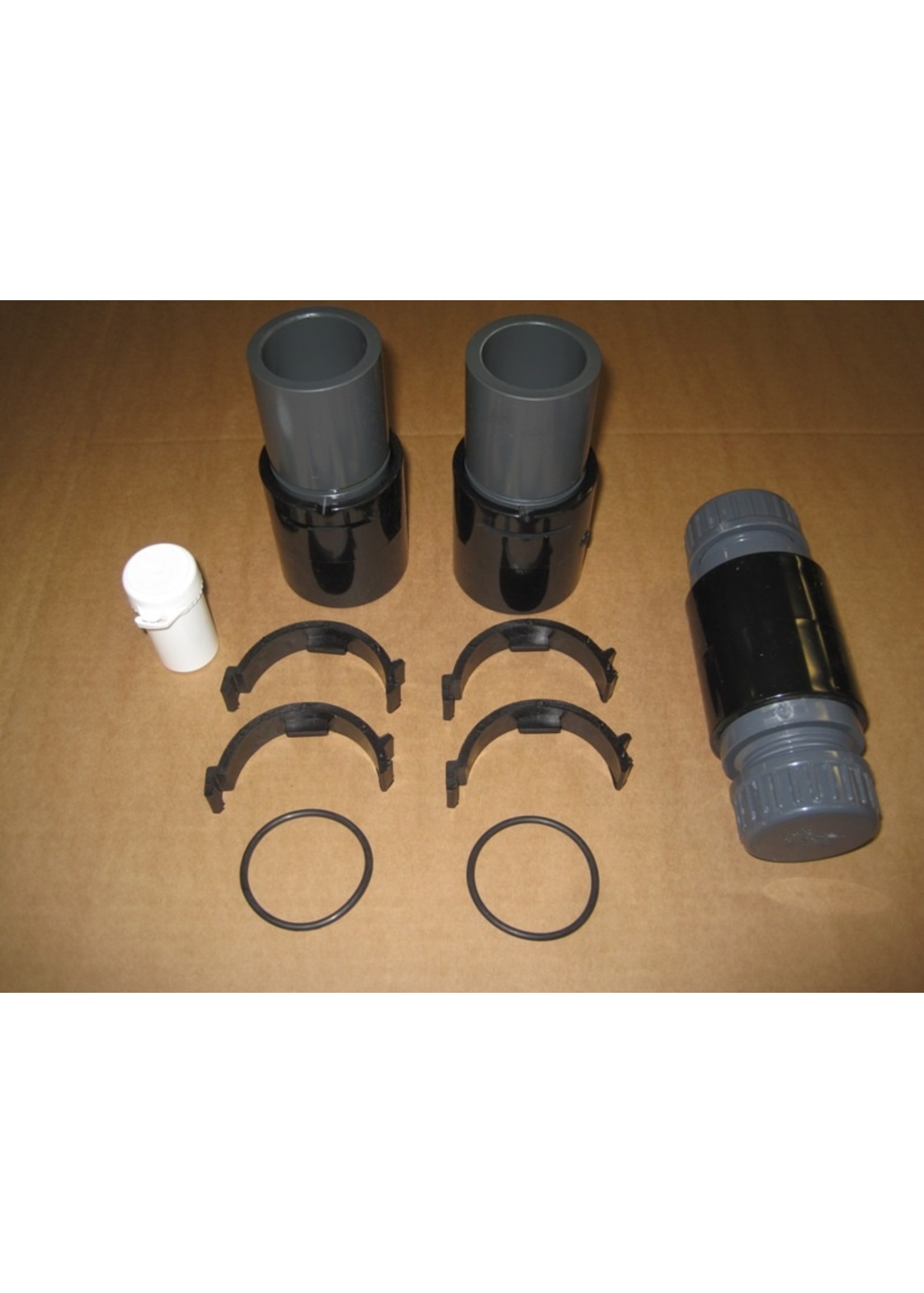 Elios Aansluitset: 2 x koppelstuk M; 2 x koppelstuk V; 2 x leegloopstop; 1 mof