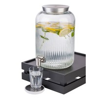 Glass drink dispenser with stainless steel tap