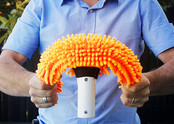 Aquafinger flexible microfiber brush.