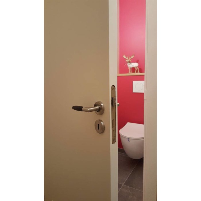 In-Door Copenhagen door handles made of solid stainless steel with black handle