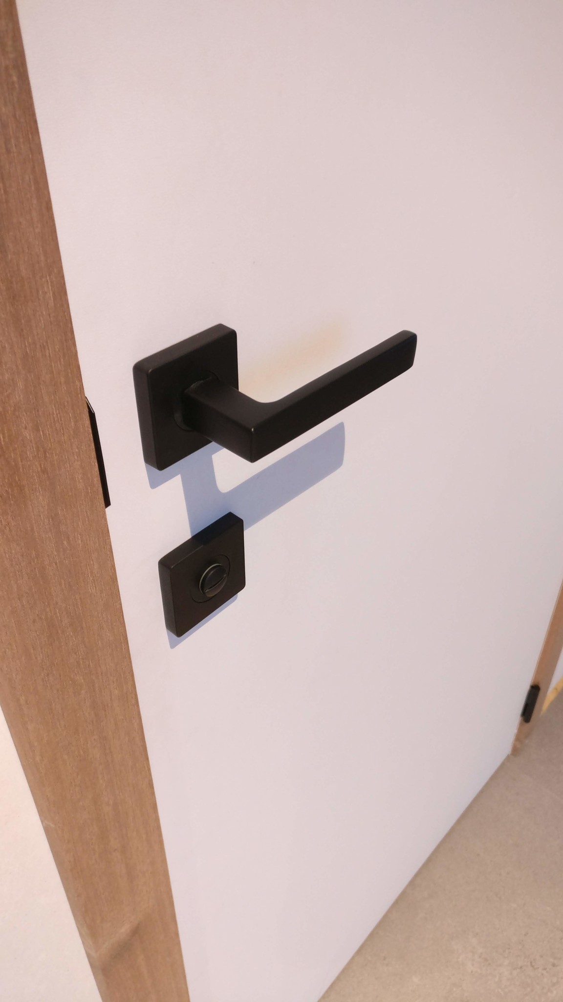 Door handles Hera on square rosette matt black without key plates