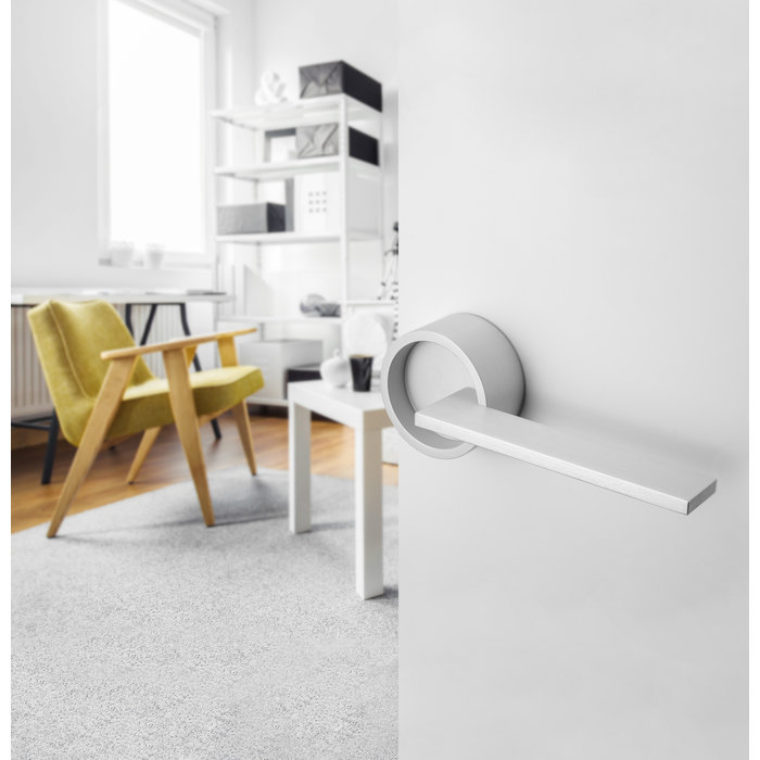 DnD Exclusieve  witte deurklink TIMELESS met sleutelplaatjes