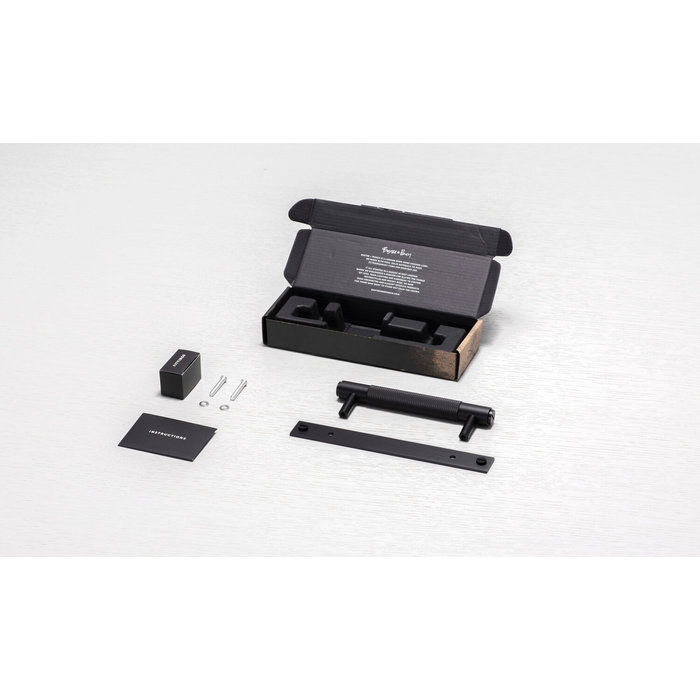 Buster+Punch Black furniture handle on plate Buster+Punch