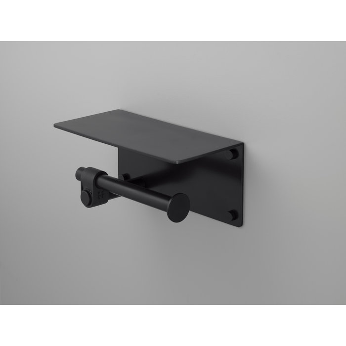 Buster+Punch Solid black toilet roll holder with shelf from Buster&Punch with an industrial look