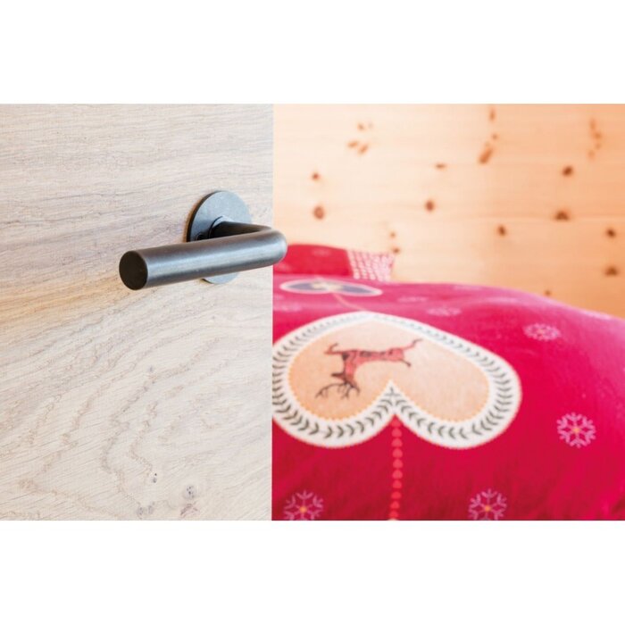 HALCO HALCÖ door handles SÖLDEN on a round rosette - visibly screwed - Black steel