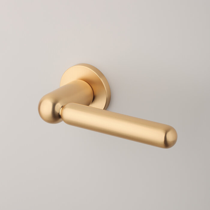 Aprile Poignées de porte Solid APRILE prestige RUBIA sur rosace ronde - Or mat