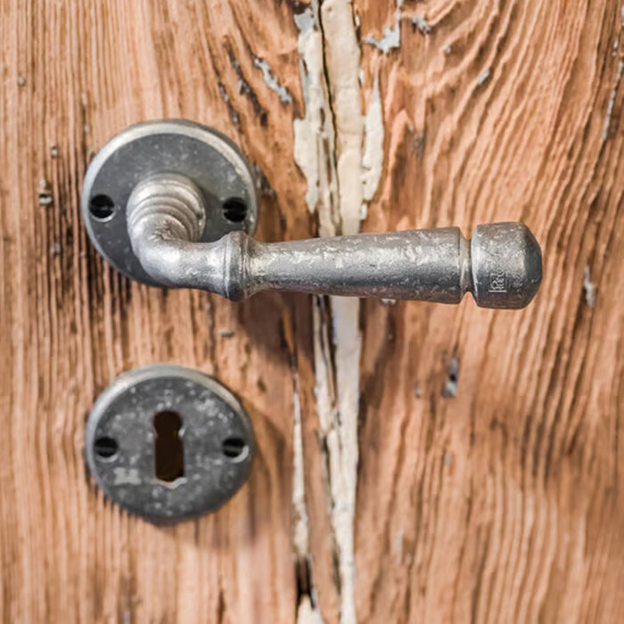 Dauby Poignée de porte Dauby Pure PH1830 / 50R sur rosace ronde – métal brut (RM)