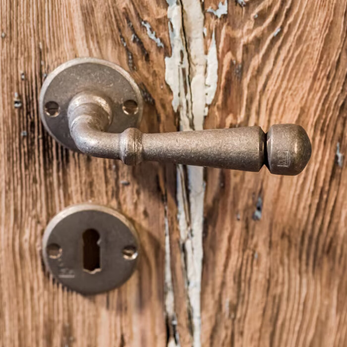 Dauby Poignée de porte Dauby Pure PH1830 / 50R sur rosace ronde – bronze brut (RB)