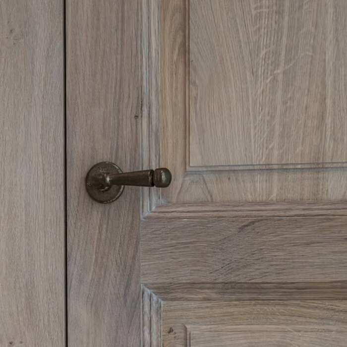 Dauby Dauby Pure door handle PH1830 / 50R on round rosette – raw bronze (RB)