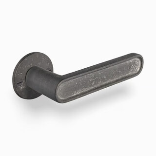 Dauby DAUBY CAST door handles on round rosette – Raw Metal (RM)
