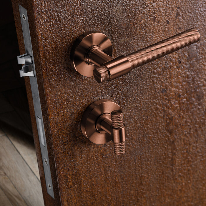 JNF Architectural Hardware Poignées de porte JNF sur rosace ronde – Cuivre titane PVD