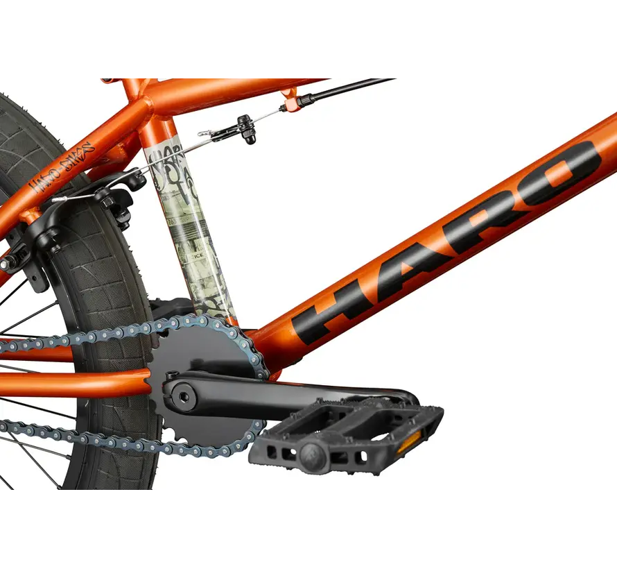 Bicicleta BMX Haro Downtown 20 color naranja brillante cobrizo, ideal para principiantes, con cuadro resistente de acero de alta resistencia y ruedas de 20 pulgadas.