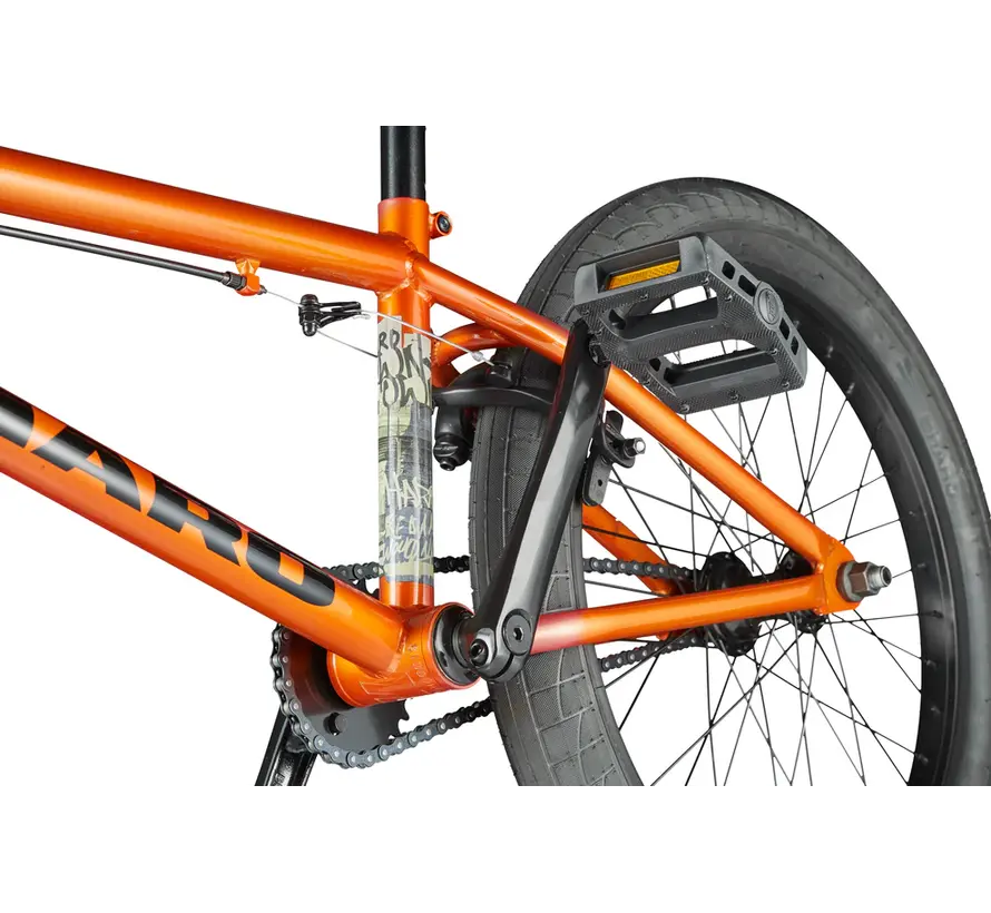 Bicicleta BMX Haro Downtown 20 color naranja brillante cobrizo, ideal para principiantes, con cuadro resistente de acero de alta resistencia y ruedas de 20 pulgadas.