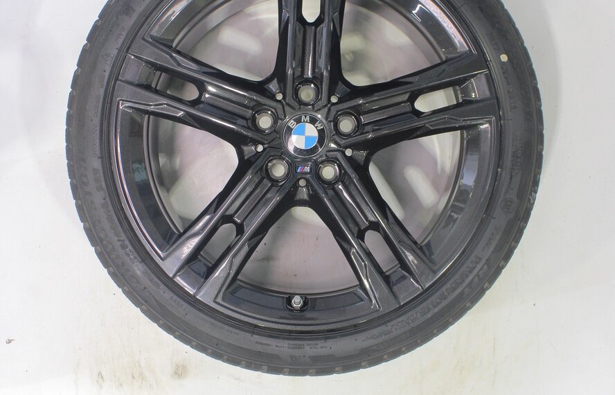 BMW BMW 1 2 serie F40 F44 2 serie Gran Coupe 556M 18 inch velgen Bridgestone Runflat Winterbanden Origineel