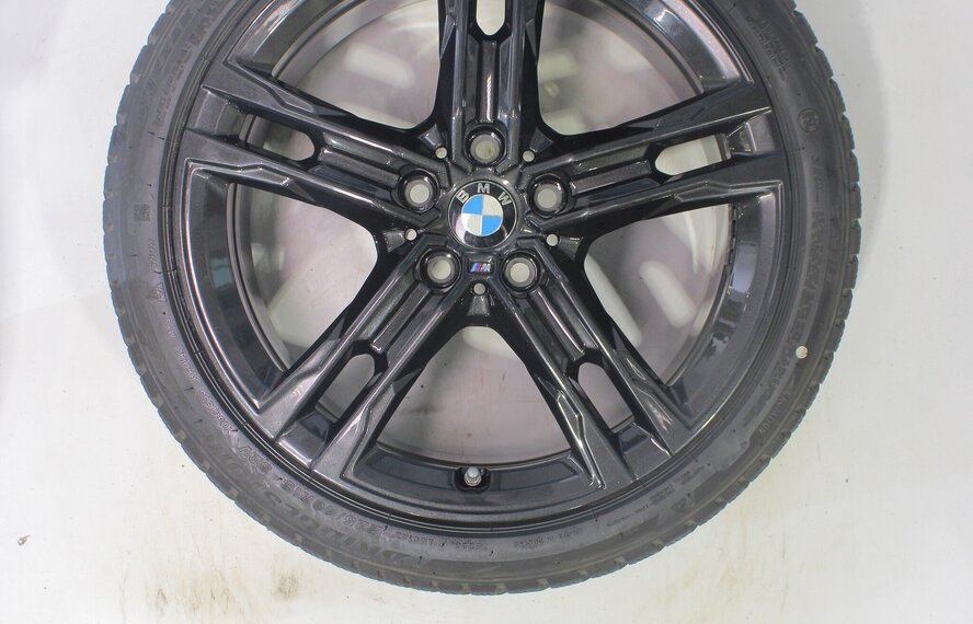 BMW BMW 1 2 serie F40 F44 2 serie Gran Coupe 556M 18 inch velgen Bridgestone Runflat Winterbanden Origineel