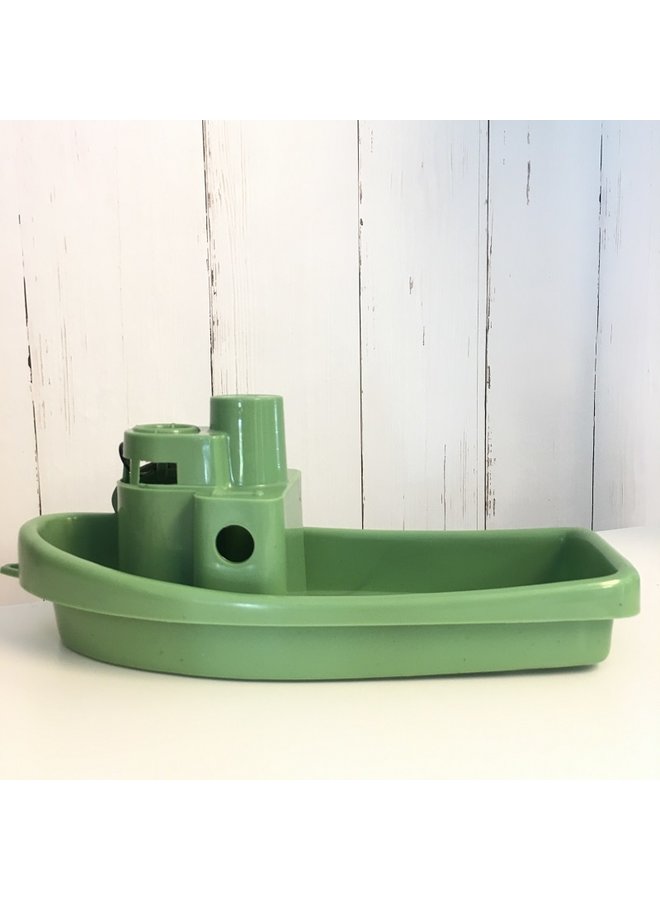 green toy boat
