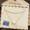 GO-DUTCH LABEL Go Dutch Label Edelstalen Ketting Kort Mini Bol Hartje Goudkleurig