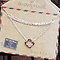 GO-DUTCH LABEL Go Dutch Label Edelstalen Ketting Kort Open Klaver Rosegoudkleurig