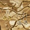 BIBA OORBELLEN Biba Thin Creole 21mm Gold or silver with a cross charm of strass