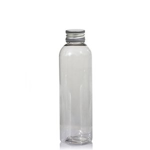 pet fles rond 250ml gevuld met scrubzout