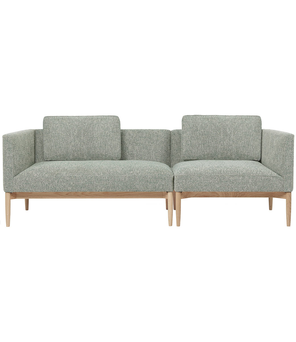 Relaxed lounging on the E300 Embrace Modular sofa | Carl Hansen