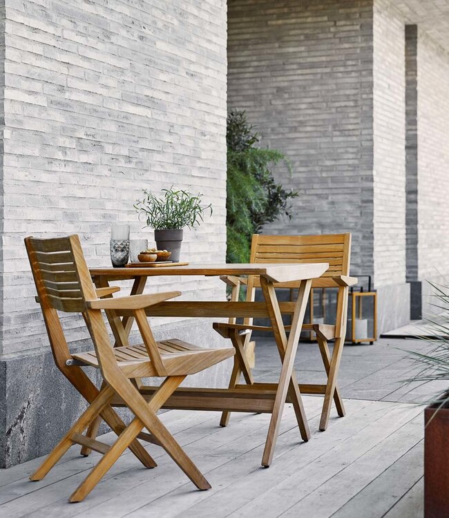 Cane-Line Showmodel Flip teak tuinstoel met armleuningen