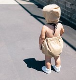 STOERE MOSTERDGELE ROMPER MET CAPUCHON VOOR MEISJES | ADAM + YVE