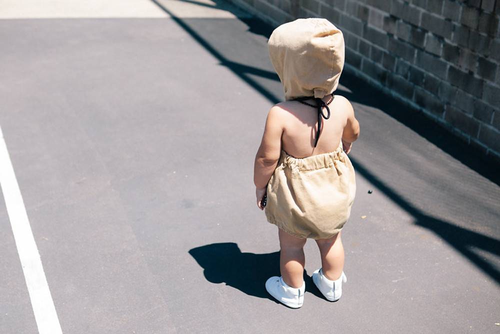 MUSTARD HOODED ROMPER | ADAM + YVE