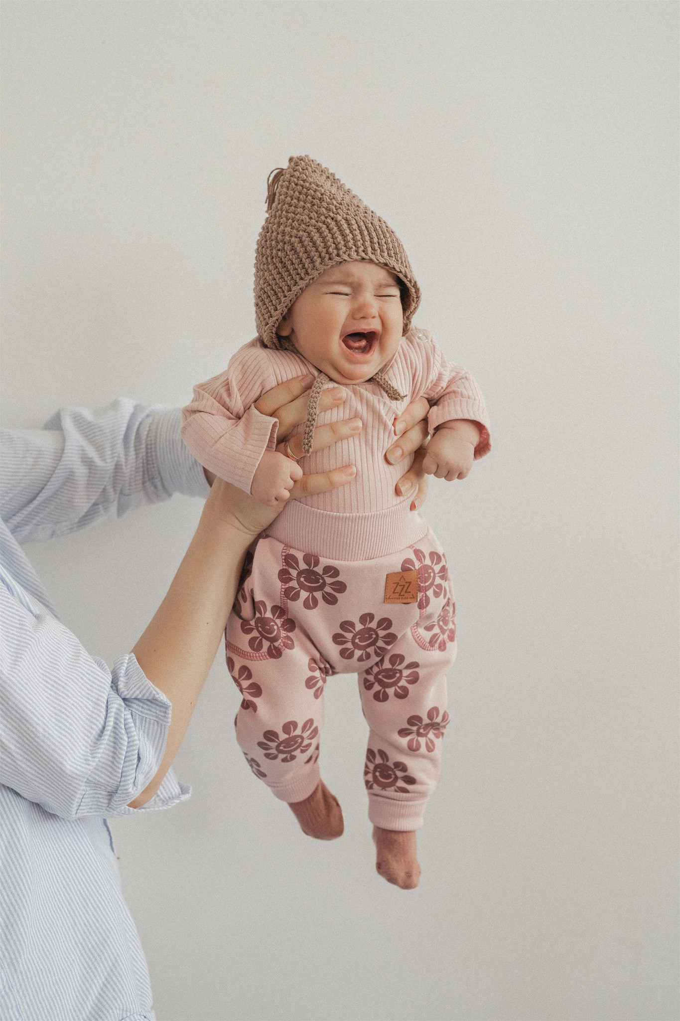 GERIBDE ROMPER | ROMPER MET LANGE MOUWEN | ROZE BABYKLEDING