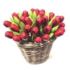 Red wooden tulips in a wicker basket