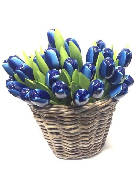 Blue wooden tulips in a wicker basket