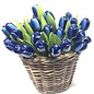 Blue wooden tulips in a wicker basket