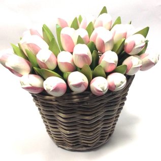 white - pink wooden tulips in a wicker basket