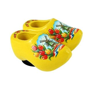 clogs with a magnet on its back in the color yellow