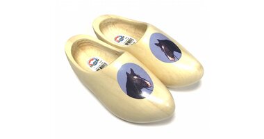Wooden shoes with an image of an animal