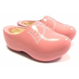 Pink wooden clogs with piping
