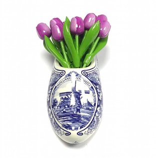 Purple wooden tulips in a Delft blue clog