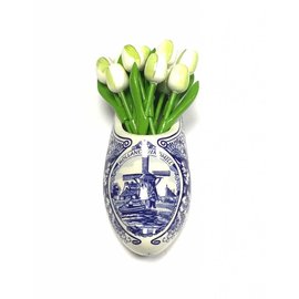 Witte houten tulpen in een Delfts blauwe klomp