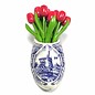 Pink wooden tulips in a Delft blue clog