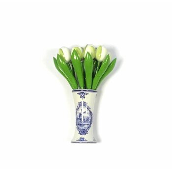 small wooden tulips in white in a Delft blue vase