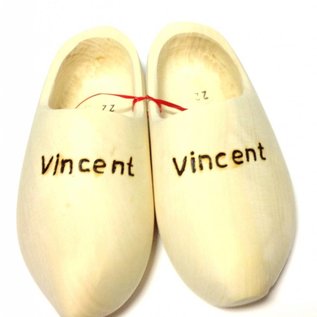 Wooden shoes with engraving