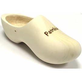 Wooden shoe with engraving designed as a plant hanger