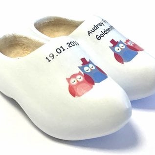 birth clogs with a name and date or an image.